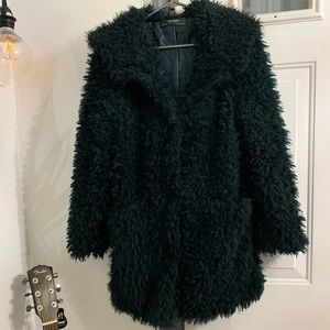 Soft and shaggy faux fur Zara coat with a hood.